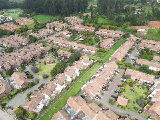 An aerial shot of a group of houses